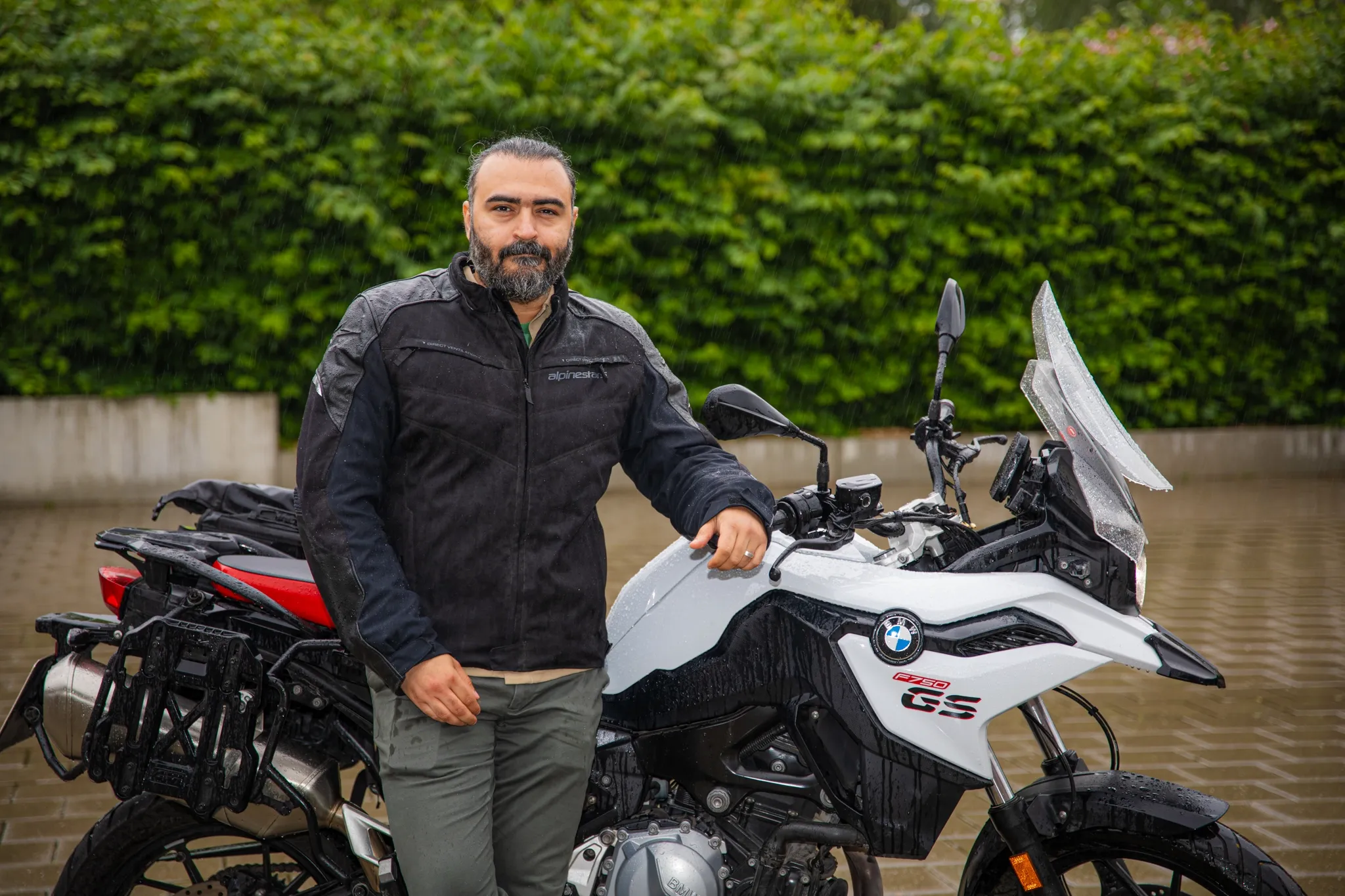 Behnam next to his motorbike